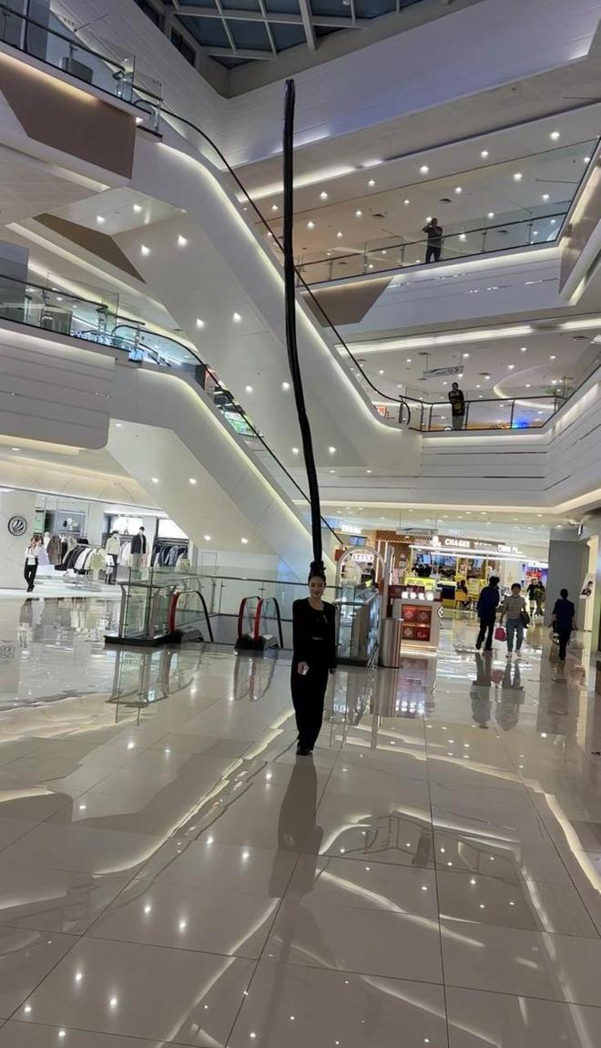 浙江一理发师为女子设计2层楼高发型网友：这发型确实挺显高(图3)